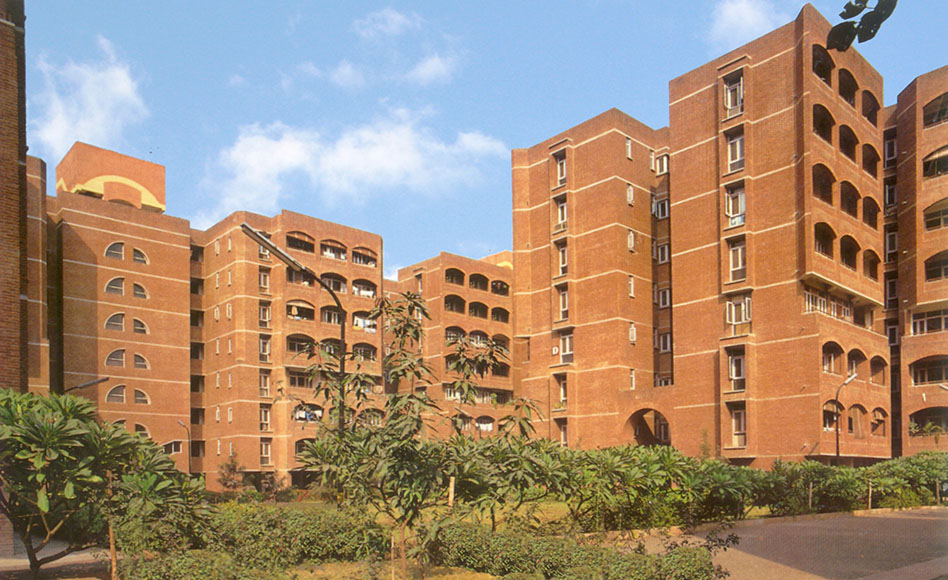 Residential housing architecture with exposed brick towers designed by CP Kukreja Architects in Delhi